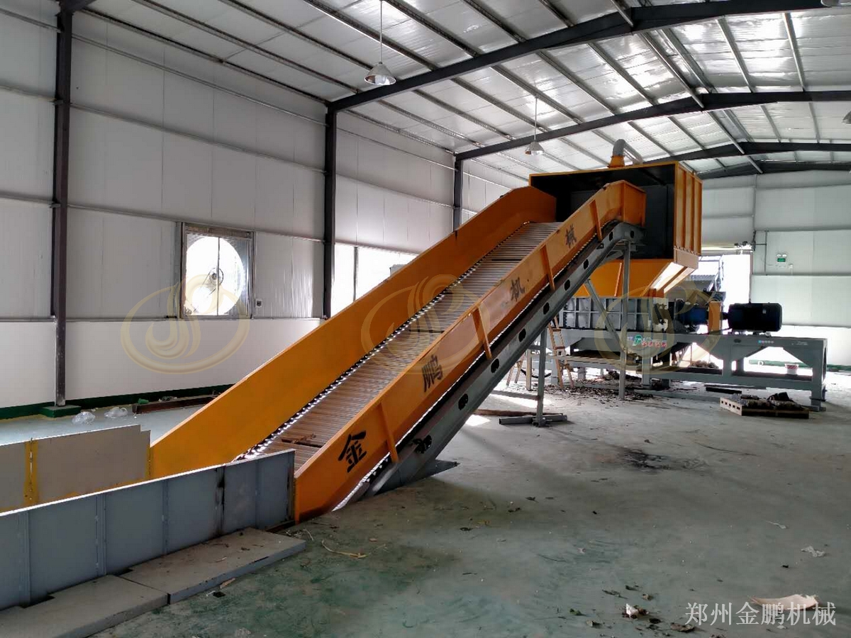 郑州金鹏废旧床垫破碎机：PS65200双轴撕碎机**减容方案